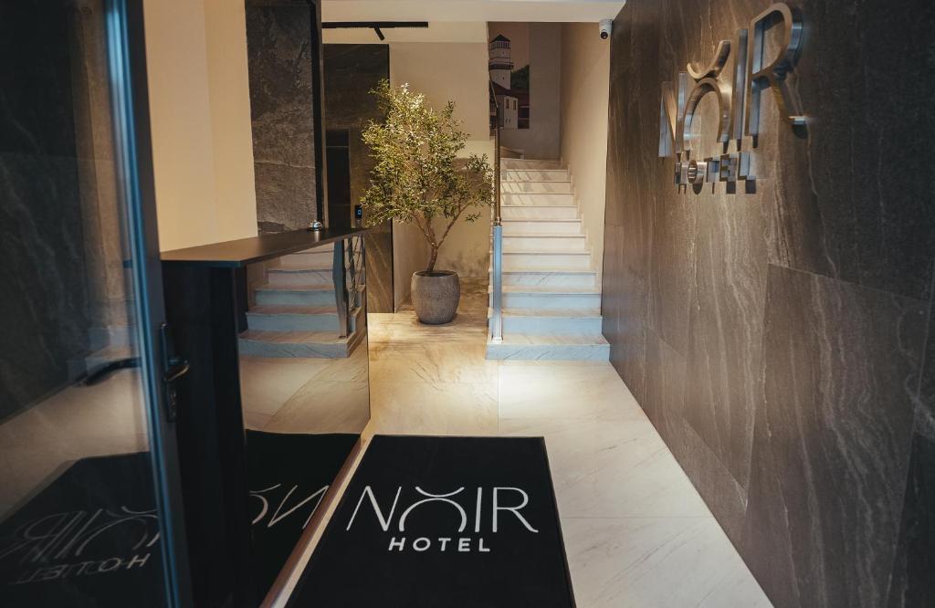 Noir Hotel entrance and lobby